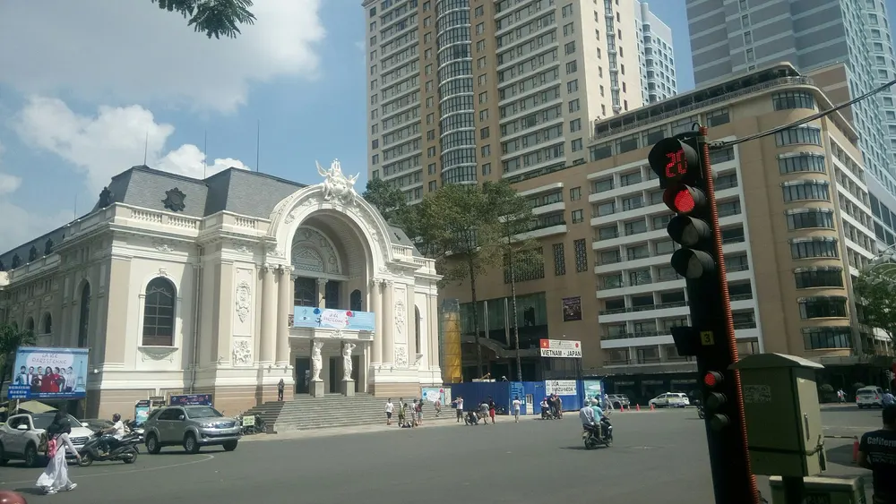 Ho Chi Minh City Opera House beside modern towers