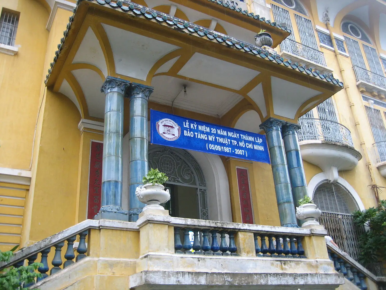 Yellow façade and entrance of the Ho Chi Minh City Museum of Fine Arts