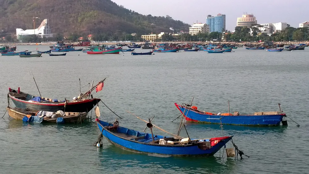 Blue fishing boats moored off Bãi Trước (Front Beach), Vũng Tàu