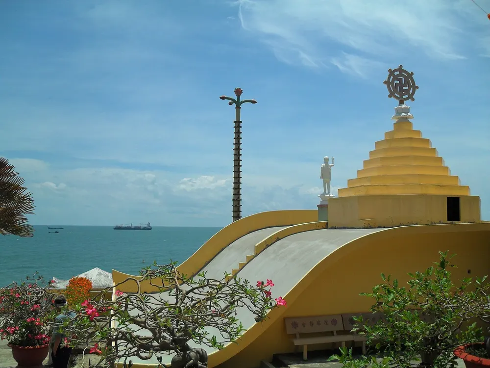 Golden roof of Niết Bàn Tịnh Xá pagoda by the sea in Vũng Tàu