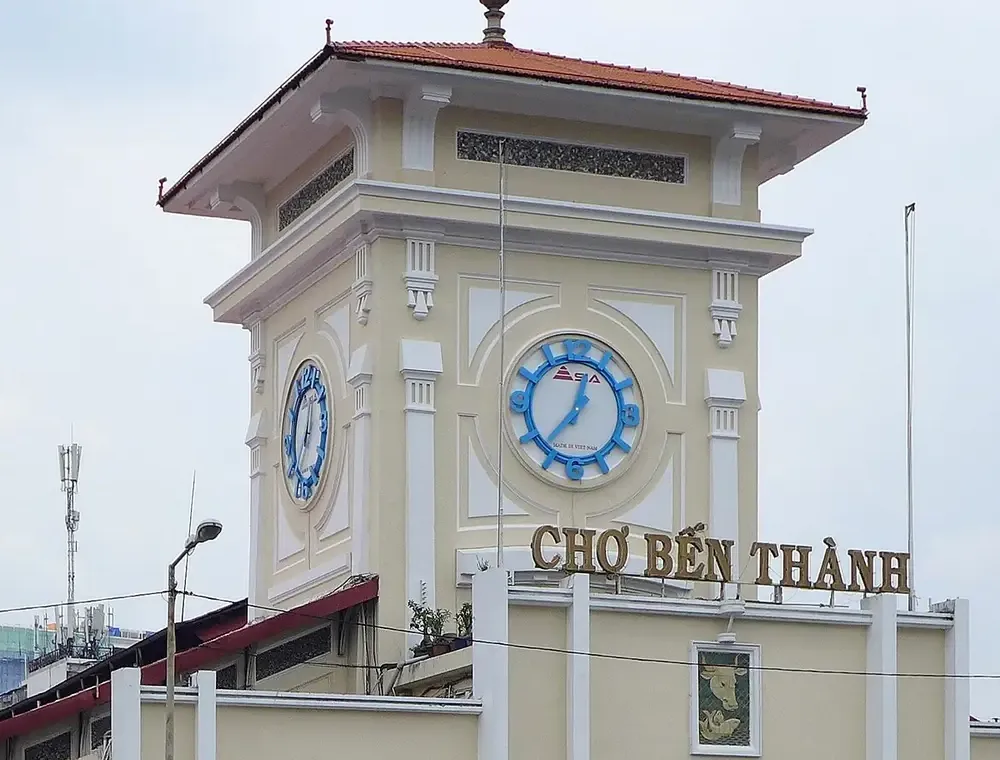 Clock tower of Bến Thành Market with its Chợ Bến Thành name sign, Ho Chi Minh City
