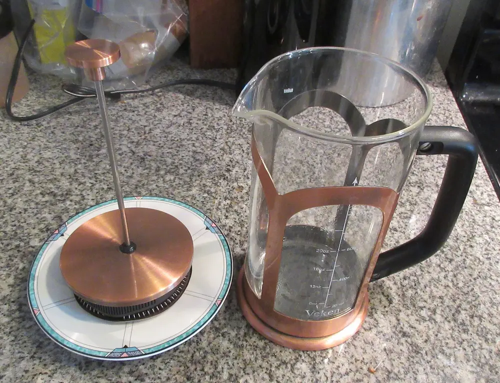 Glass French press on a table